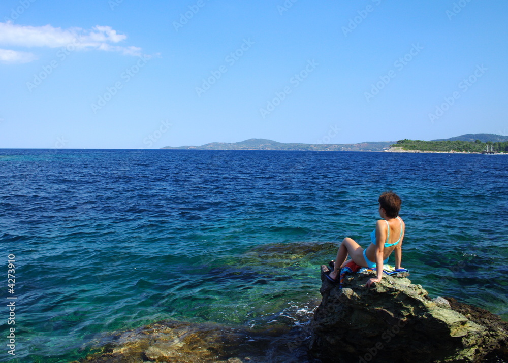 young girl on the coast