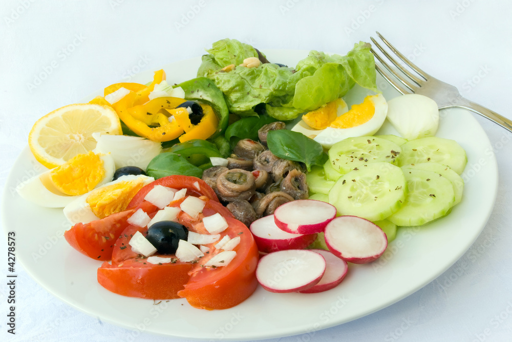 delicatessen anchovy mixed - vegetable salad with boilrd eggs delicatessen anchovy mixed - vegetable salad with boilrd eggs