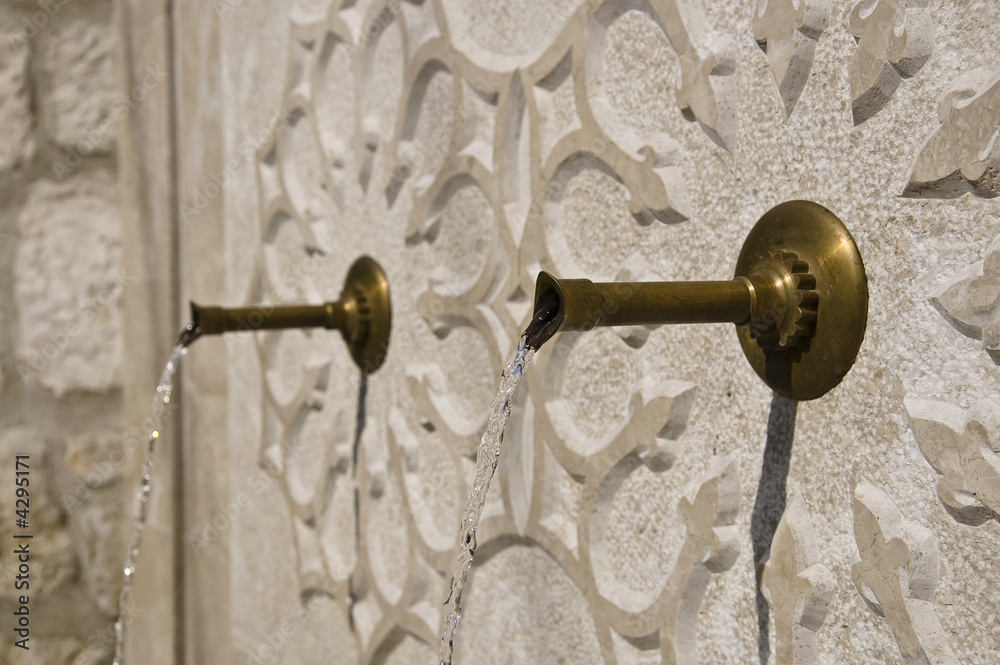 Old Style Water Fountain with Ornament Carved in Stone Old Style Water Fountain with Ornament Carved in Stone