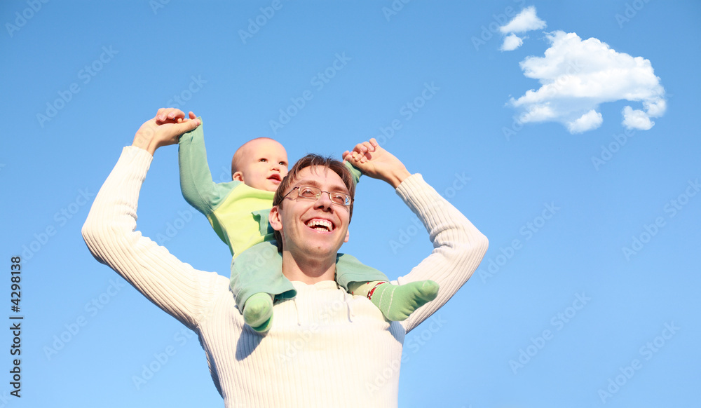 Father with son on shoulders Father with son on shoulders