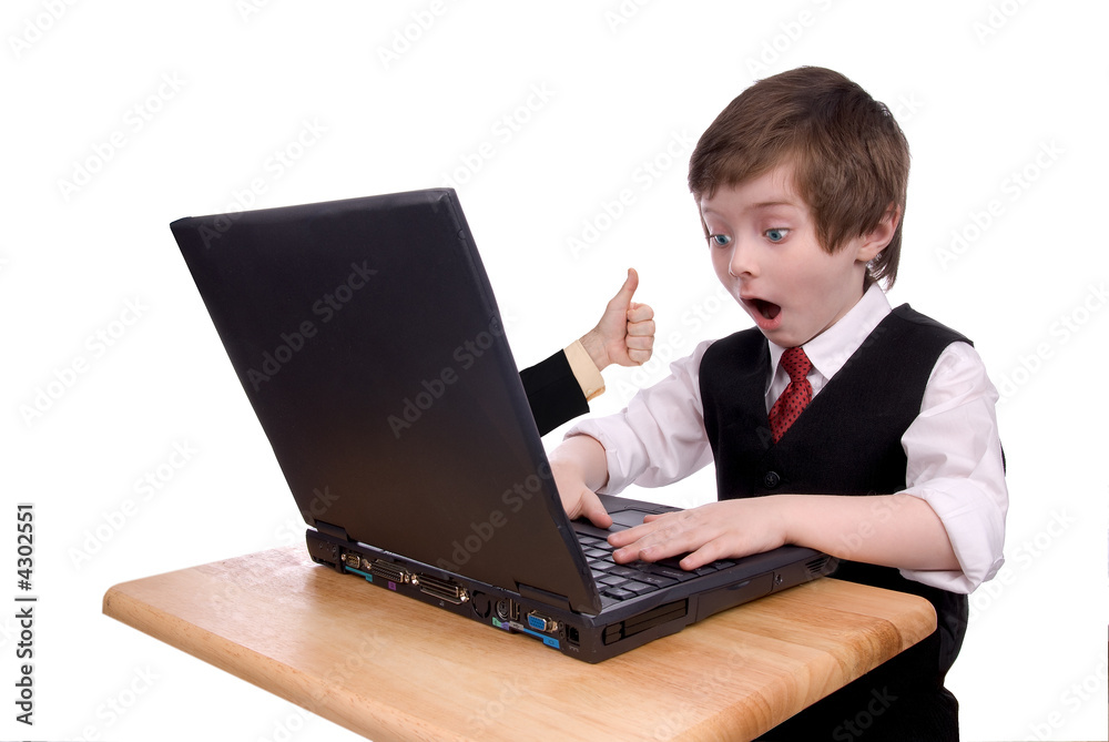 Young boy dressed in suit looks surprised Young boy dressed in suit looks surprised