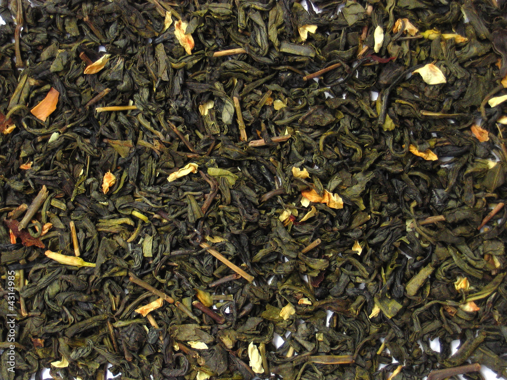 Aromatic green tea leaves with jasmine petal Aromatic green tea leaves with jasmine petal