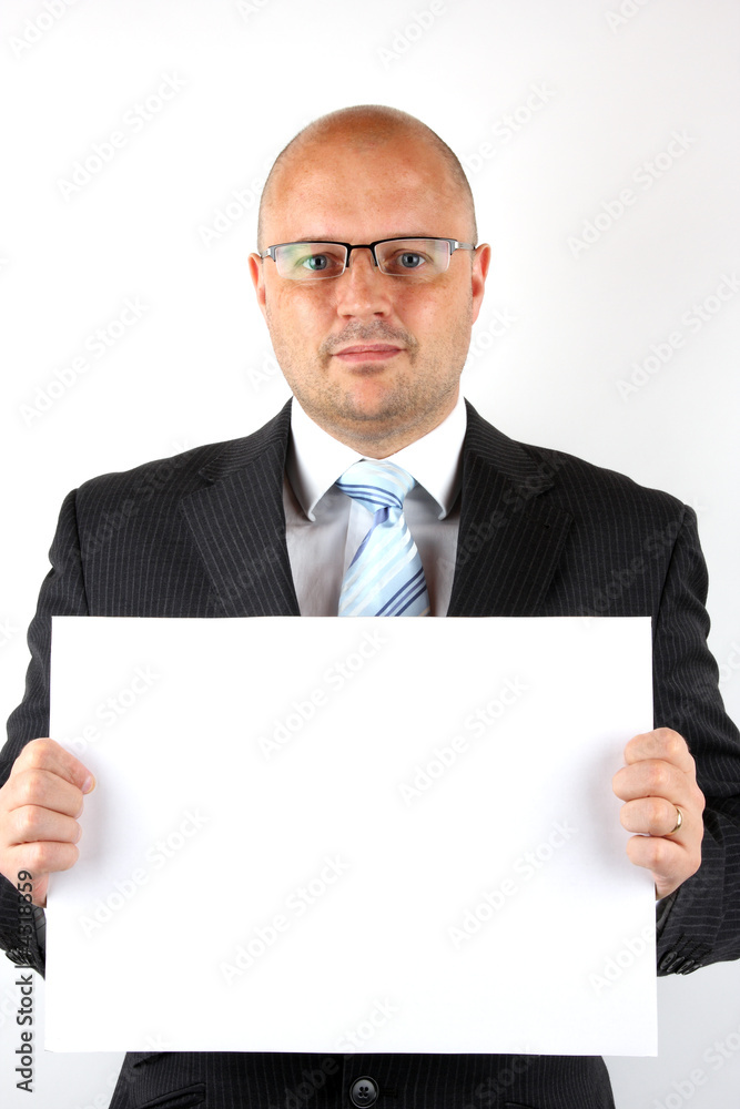 Businessman holding a blank sign for your message Businessman holding a blank sign for your message