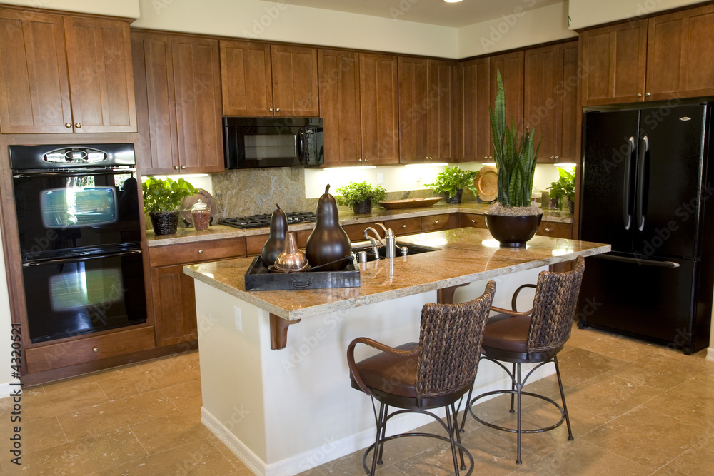 Kitchen with island and chairs