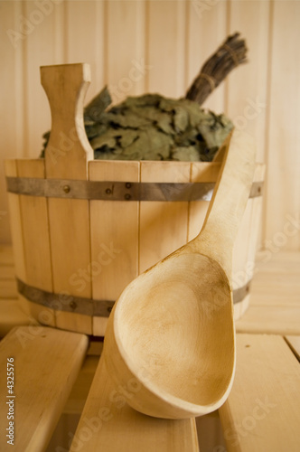 Wooden wash-tub with scoop in steam bath-room 2   photo