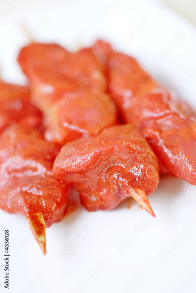 raw chicken kebabs marinated in a chinese sauce raw chicken kebabs marinated in a chinese sauce