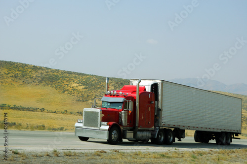 Semi truck going fast on interstate highway