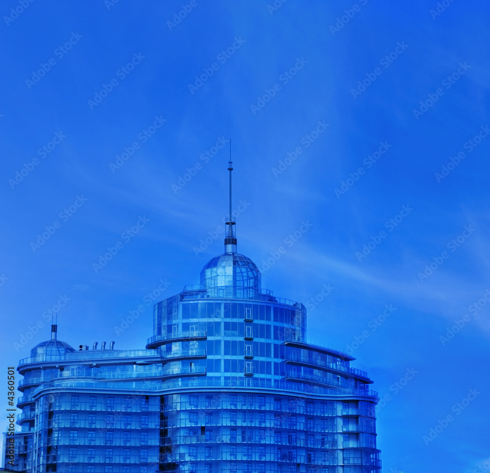 Obraz premium Urban office building over blue sky