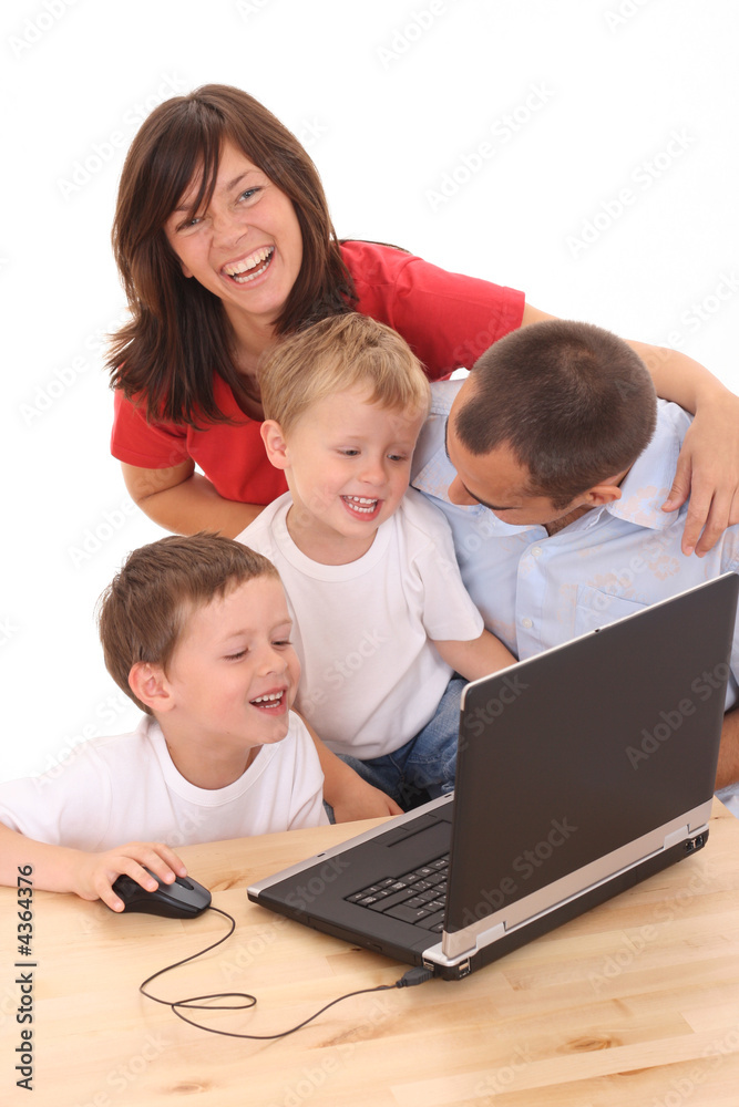 family using laptop