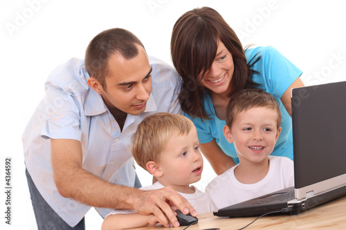 family using laptop