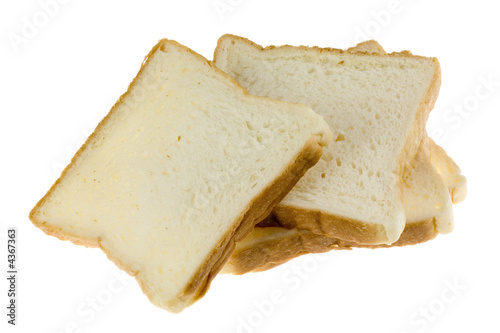 Pile of slices of bread isolated on white background