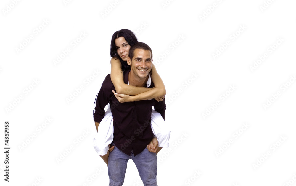 Happy teenage couple in piggyback ride - isolated Happy teenage couple in piggyback ride - isolated