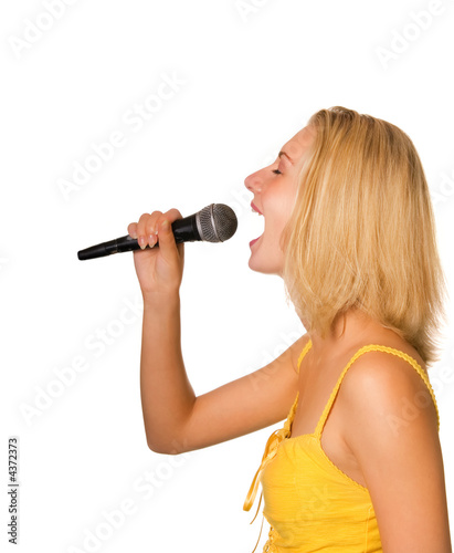 Beautiful young girl singing a song