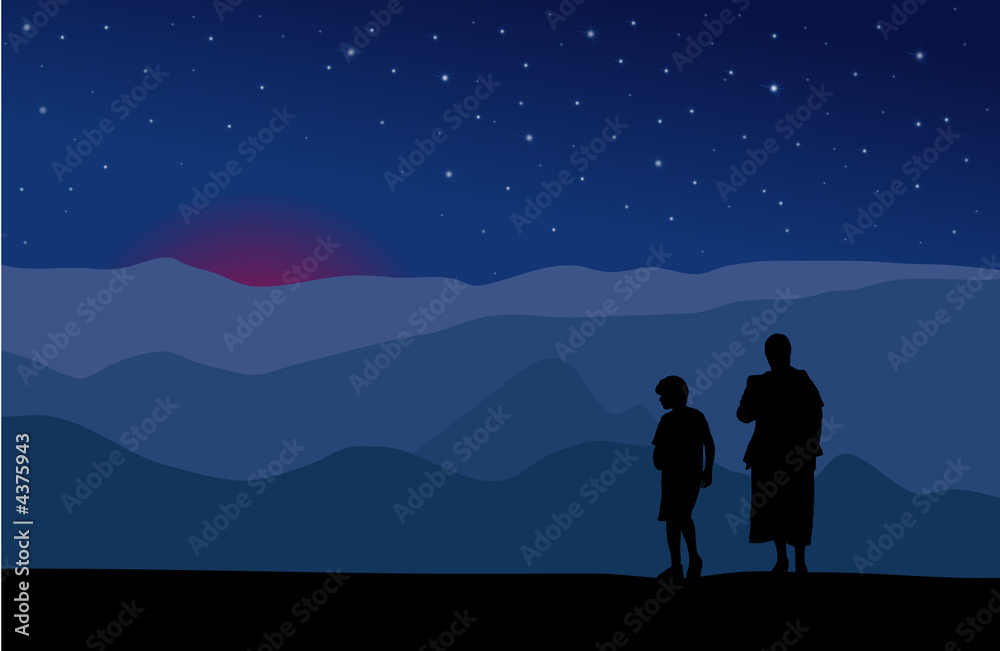 silhouettes of mother and son watching night sky