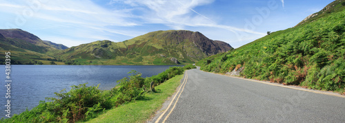 Empty lakeside road panorama