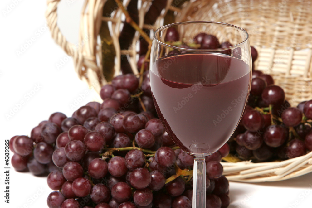 Red wine and grapes