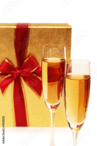 Giftbox and champagne isolated on the white