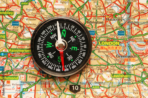 Compass over the map of UK - London suburbs