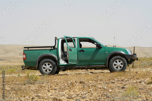 green pickup truck, in sede boker desert, israel