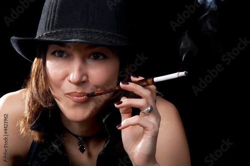 Woman with cigarette holder