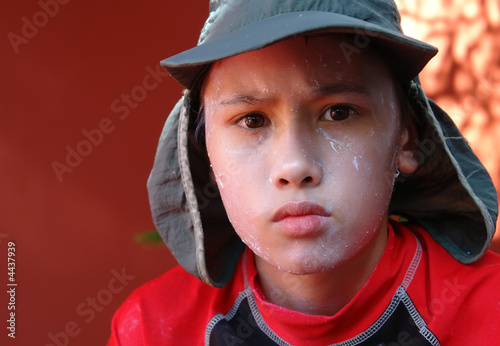 boy with sunscreen and hat 