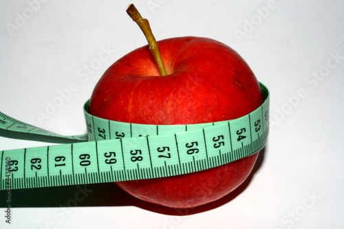 Red apple with metre