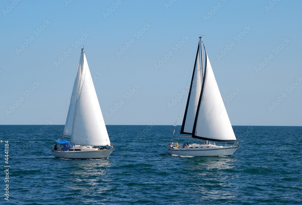 Two sailboats on a summer day