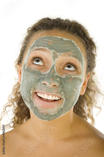 Girl in green face mask photo