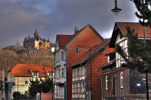 medieval castle on the hill and red roofed street in Wernigerode