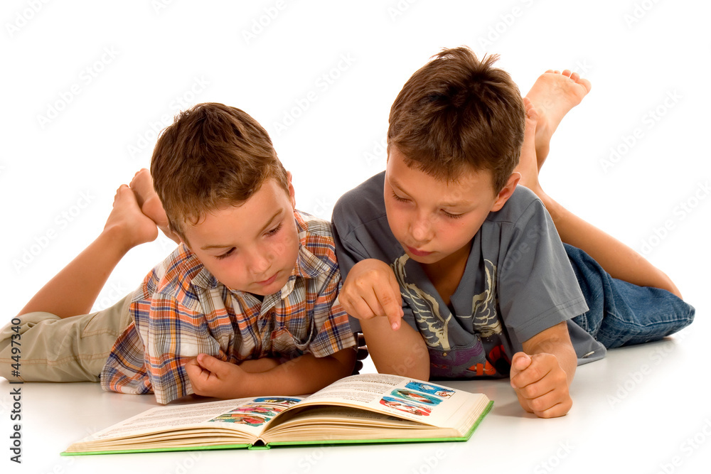 two little boys reading