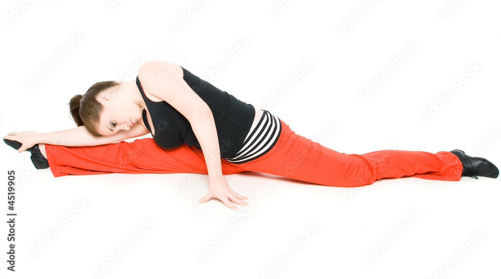 A young girl stretching