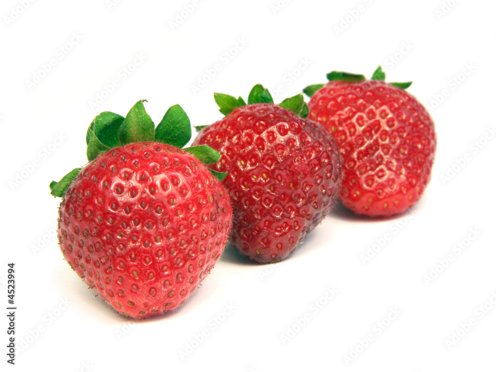 Three strawberries isolated on white background. Three strawberries isolated on white background.