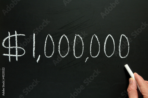 One million dollars, written on a blackboard.