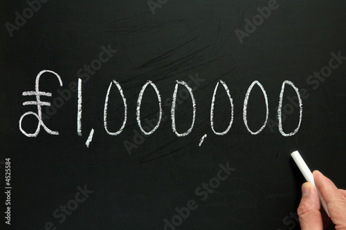 One million pounds, written on a blackboard. photo