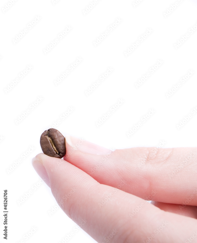 hand with coffee beans