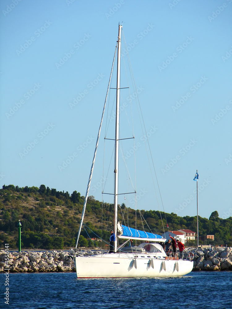 Fototapeta premium yacht preparing to mooring