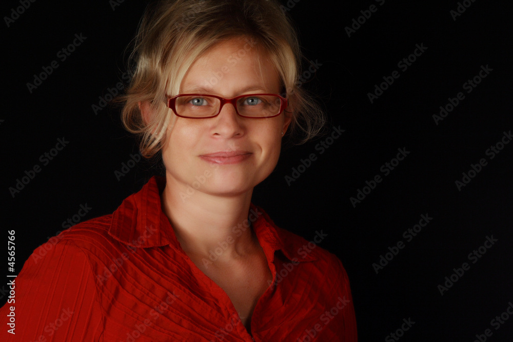 blond woman wearing glasses