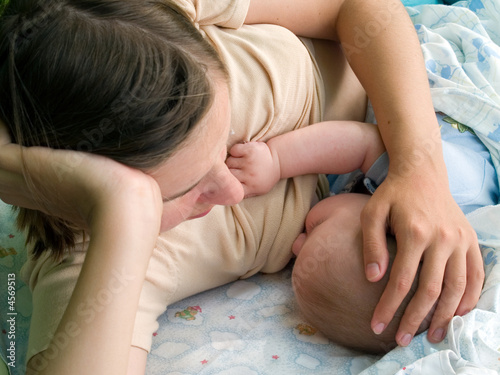 mother breast feeding her baby