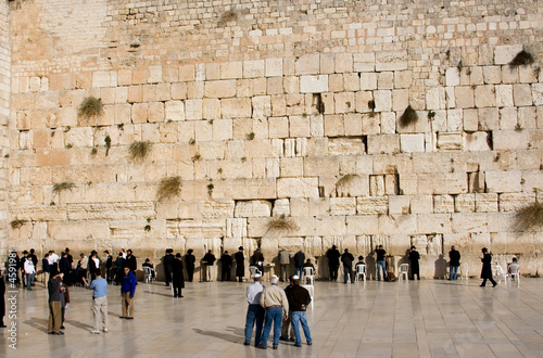 The religious orthodox Jews prays at the western wall.