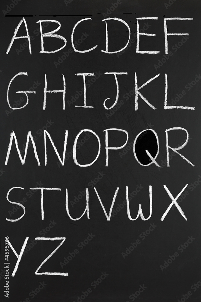 The alphabet in capitals written with white chalk. The alphabet in capitals written with white chalk.