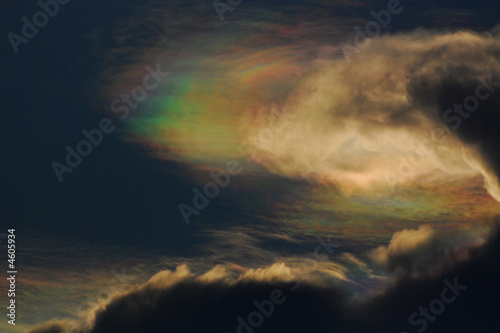 Rainbow clouds and blue skies