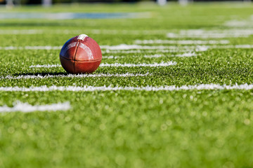 Football on Yardage Line
