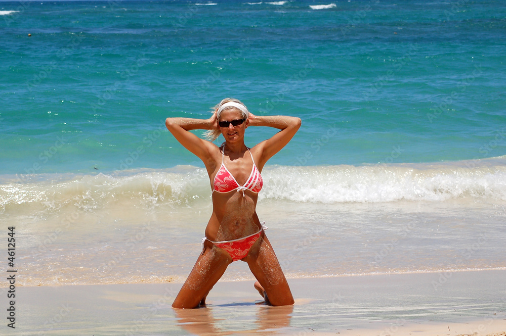 Fototapeta premium Girl in bikini on the beach