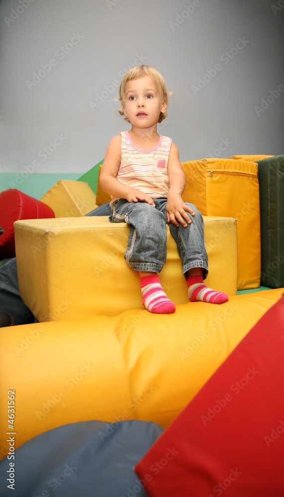 little girl in the playroom little girl in the playroom