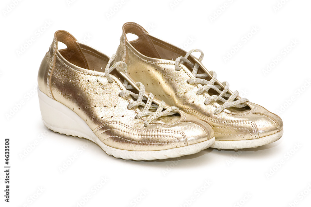 Shiny woman shoes isolated on white background Shiny woman shoes isolated on white background