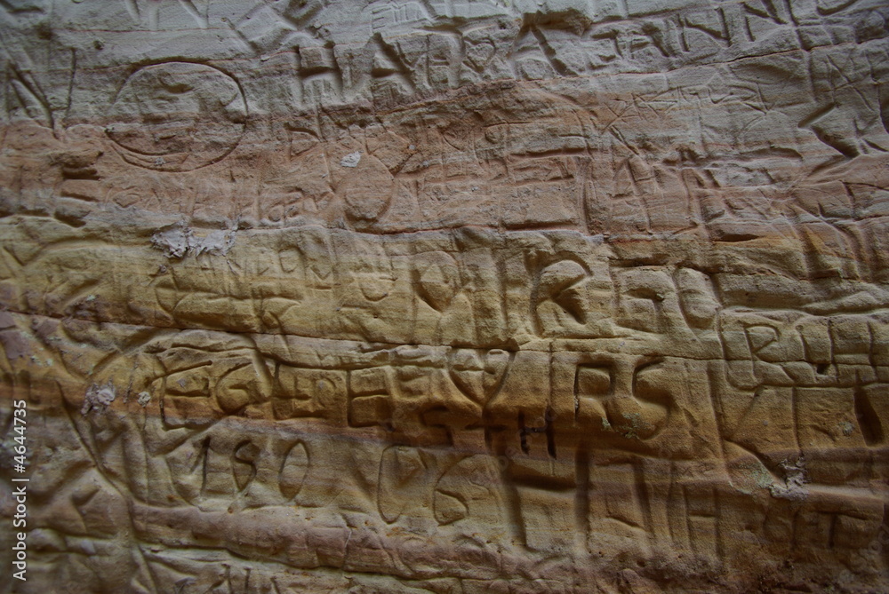 Carved names and things in sandstone 