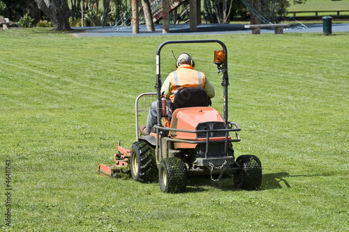 Man on Ride-On mower cutting grass