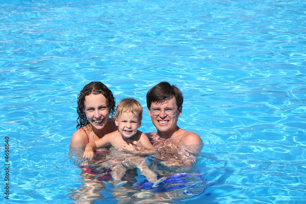 family in water