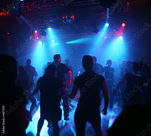 Dancing people in an underground club