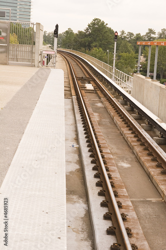 Fototapeta Naklejka Na Ścianę i Meble -  Commuter Train Tracks